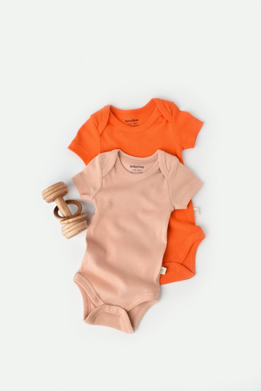 Set 2 body-uri bebe unisex din bumbac organic si modal - Rodie/Piersica